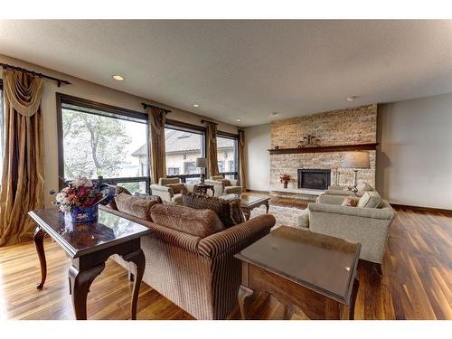 170 Jarvis Bay Drive, Jarvis Bay, AB - Indoor Photo Showing Living Room With Fireplace