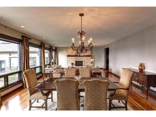 170 Jarvis Bay Drive, Jarvis Bay, AB - Indoor Photo Showing Dining Room With Fireplace