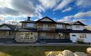 17 Oak Avenue, Okotoks, AB  - Outdoor With Deck Patio Veranda With Facade 