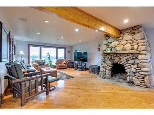 17 Oak Avenue, Okotoks, AB - Indoor Photo Showing Living Room With Fireplace