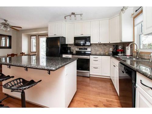 27110 Township Road 395, Rural Lacombe County, AB - Indoor Photo Showing Kitchen With Double Sink