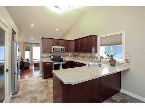 199 Cedar Square, Blackfalds, AB - Indoor Photo Showing Kitchen With Double Sink