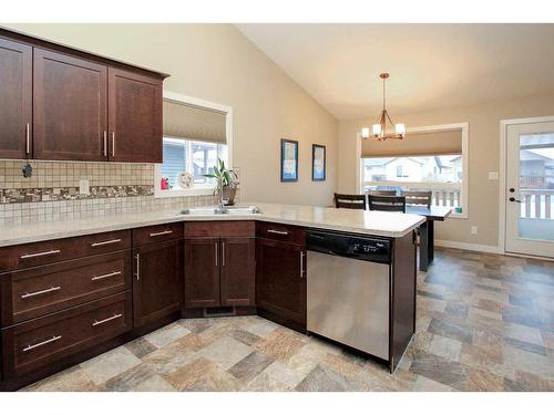 199 Cedar Square, Blackfalds, AB - Indoor Photo Showing Kitchen With Double Sink