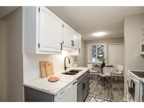 7-80 Piper Drive, Red Deer, AB - Indoor Photo Showing Kitchen With Double Sink