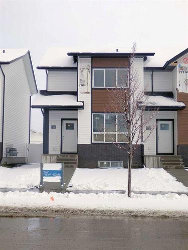 2 A Evergreen Way, Red Deer, AB - Outdoor With Facade