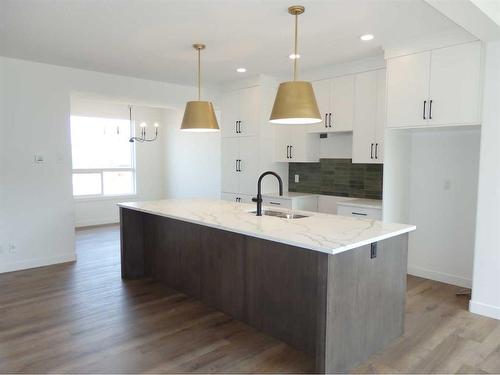 2 A Evergreen Way, Red Deer, AB - Indoor Photo Showing Kitchen With Upgraded Kitchen