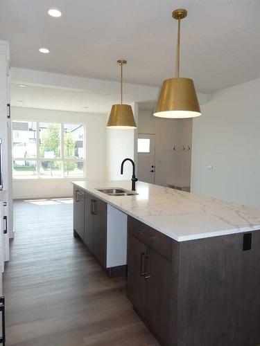 2 A Evergreen Way, Red Deer, AB - Indoor Photo Showing Kitchen With Double Sink