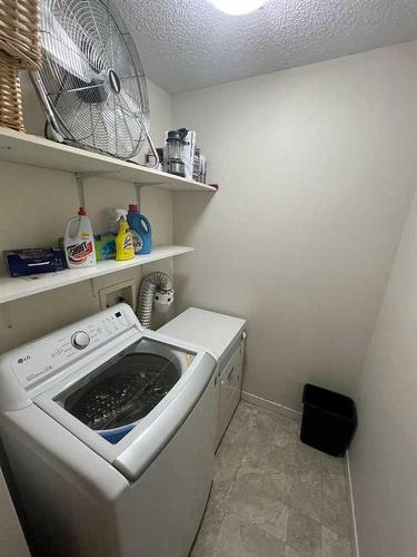 204-7164 Parke Avenue, Red Deer, AB - Indoor Photo Showing Laundry Room