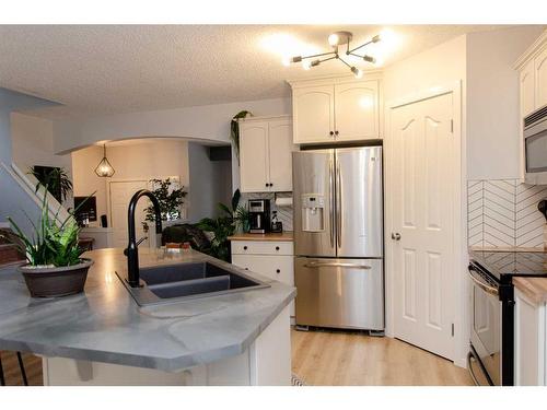 62 Joice Close, Red Deer, AB - Indoor Photo Showing Kitchen With Double Sink