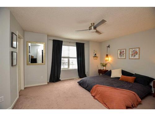 62 Joice Close, Red Deer, AB - Indoor Photo Showing Bedroom