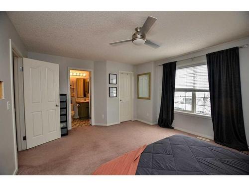 62 Joice Close, Red Deer, AB - Indoor Photo Showing Bedroom