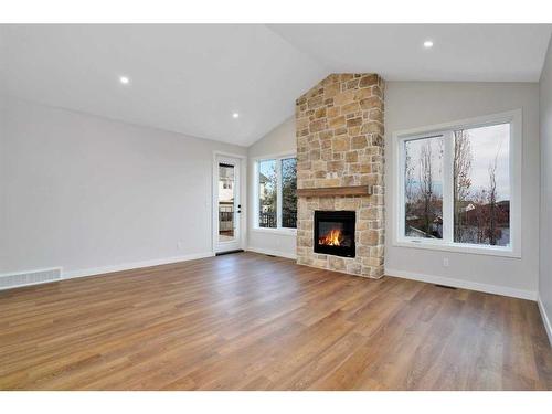 101-5300 60 Street, Sylvan Lake, AB - Indoor Photo Showing Living Room With Fireplace