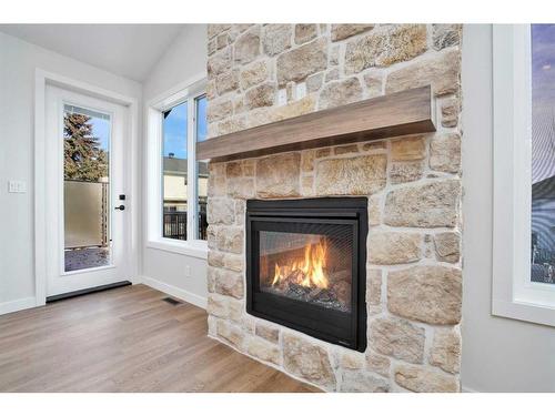 101-5300 60 Street, Sylvan Lake, AB - Indoor Photo Showing Living Room With Fireplace