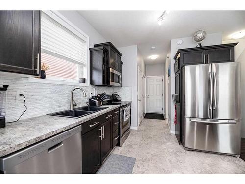 200 Kershaw Close, Red Deer, AB - Indoor Photo Showing Kitchen With Double Sink With Upgraded Kitchen