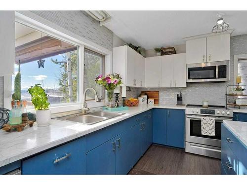 391083   6-5 Range Road, Rural Clearwater County, AB - Indoor Photo Showing Kitchen With Double Sink With Upgraded Kitchen