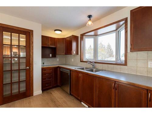 840 Osler Street, Carstairs, AB - Indoor Photo Showing Kitchen With Double Sink