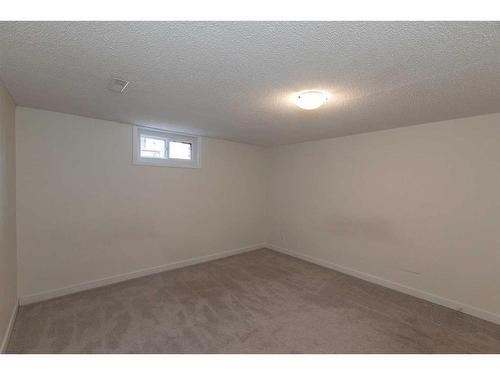 840 Osler Street, Carstairs, AB - Indoor Photo Showing Other Room