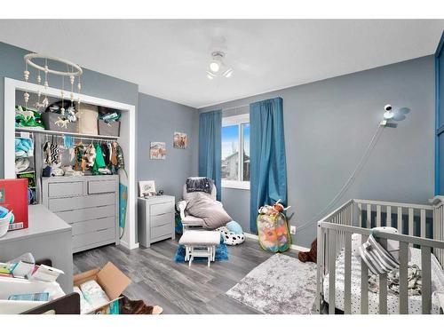 14 Hallgren Drive, Sylvan Lake, AB - Indoor Photo Showing Bedroom