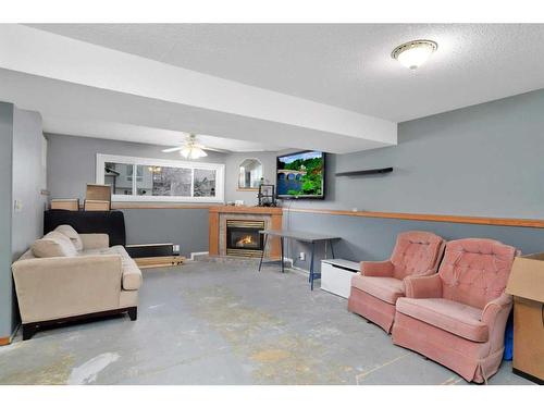 14 Hallgren Drive, Sylvan Lake, AB - Indoor With Fireplace