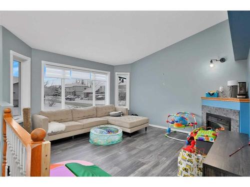 14 Hallgren Drive, Sylvan Lake, AB - Indoor Photo Showing Living Room With Fireplace