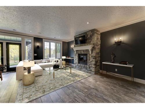 23 Bannerman Close, Red Deer, AB - Indoor Photo Showing Living Room With Fireplace