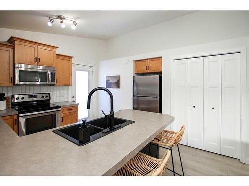 56 Trimble Close, Red Deer, AB - Indoor Photo Showing Kitchen With Stainless Steel Kitchen With Double Sink