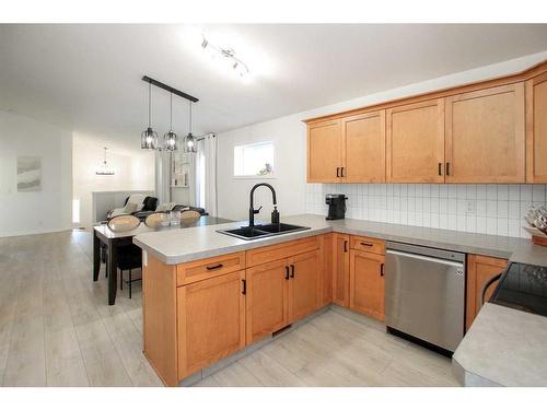 56 Trimble Close, Red Deer, AB - Indoor Photo Showing Kitchen With Double Sink