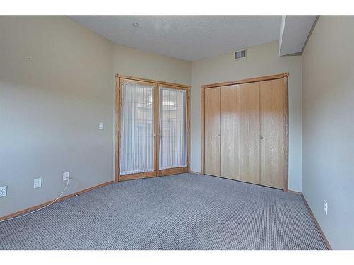 209-4512 52 Avenue, Red Deer, AB - Indoor Photo Showing Other Room