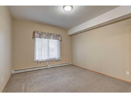 209-4512 52 Avenue, Red Deer, AB - Indoor Photo Showing Other Room