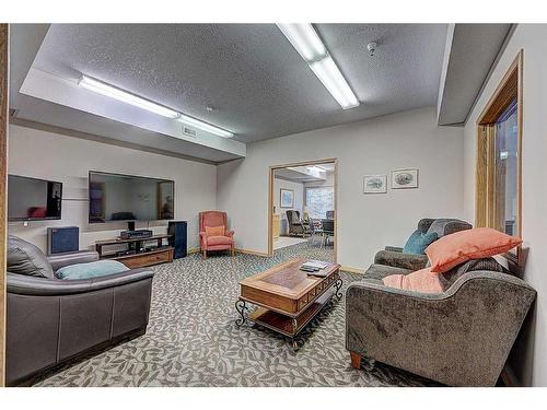 209-4512 52 Avenue, Red Deer, AB - Indoor Photo Showing Living Room