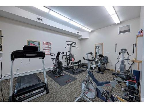 209-4512 52 Avenue, Red Deer, AB - Indoor Photo Showing Gym Room