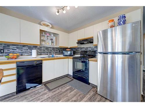 81 Kirsch Close, Red Deer, AB - Indoor Photo Showing Kitchen With Double Sink