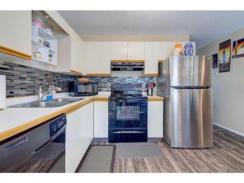 81 Kirsch Close, Red Deer, AB - Indoor Photo Showing Kitchen With Double Sink