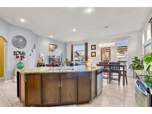 103 Vanson Close Se, Red Deer, AB - Indoor Photo Showing Kitchen With Double Sink