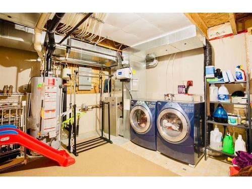 103 Vanson Close Se, Red Deer, AB - Indoor Photo Showing Laundry Room