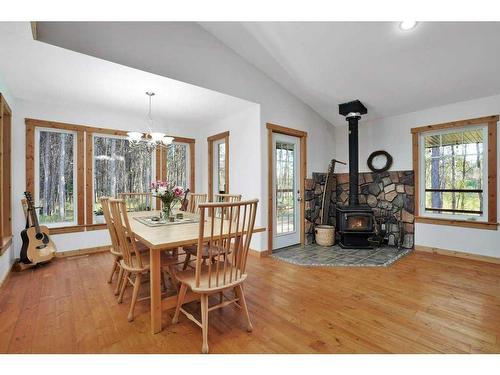 362073 Range Road 5-4, Rural Clearwater County, AB - Indoor Photo Showing Dining Room With Fireplace