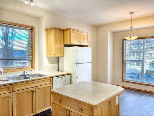 57 Abel Close West, Red Deer, AB - Indoor Photo Showing Kitchen With Double Sink