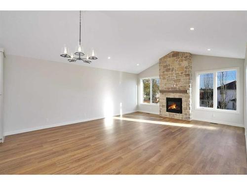 102-5300 60 Street, Sylvan Lake, AB - Indoor Photo Showing Living Room With Fireplace