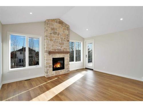 102-5300 60 Street, Sylvan Lake, AB - Indoor Photo Showing Living Room With Fireplace