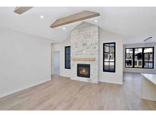 60 Larratt Close, Red Deer, AB - Indoor Photo Showing Living Room With Fireplace