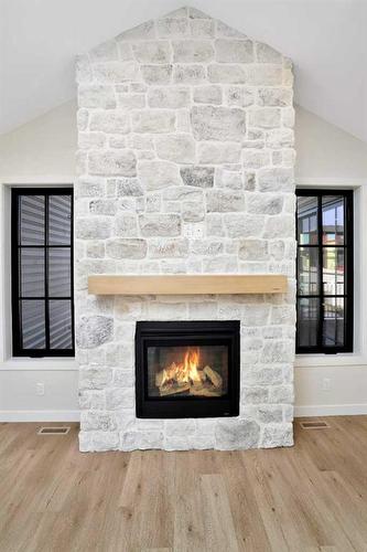 60 Larratt Close, Red Deer, AB - Indoor Photo Showing Living Room With Fireplace