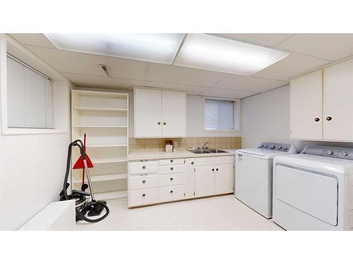 4719 53 Street, Stettler, AB - Indoor Photo Showing Laundry Room