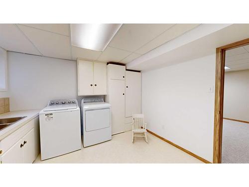 4719 53 Street, Stettler, AB - Indoor Photo Showing Laundry Room