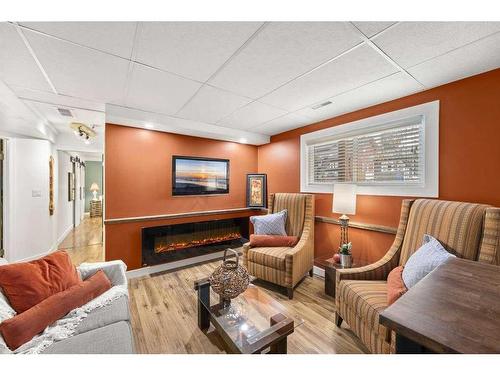 250 8 Street Se, Three Hills, AB - Indoor Photo Showing Living Room With Fireplace