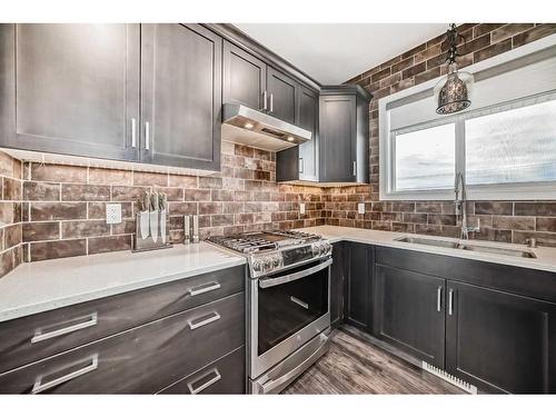 82 Mitchell Crescent, Blackfalds, AB - Indoor Photo Showing Kitchen With Double Sink