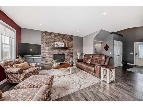 82 Mitchell Crescent, Blackfalds, AB - Indoor Photo Showing Living Room With Fireplace