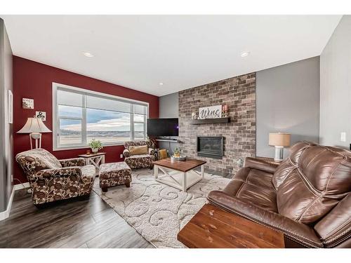 82 Mitchell Crescent, Blackfalds, AB - Indoor Photo Showing Living Room With Fireplace