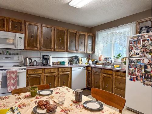 5319 Robinson Place, Bashaw, AB - Indoor Photo Showing Kitchen With Double Sink