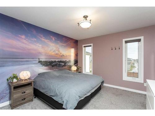 41 Mackenzie Avenue, Lacombe, AB - Indoor Photo Showing Bedroom