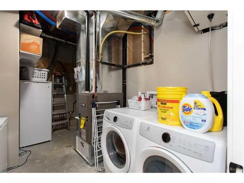 41 Mackenzie Avenue, Lacombe, AB - Indoor Photo Showing Laundry Room